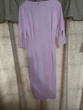 Elegant Pink Midi Dress with Embellished Sleeves